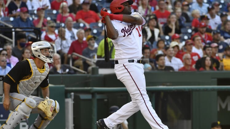 Jun 16, 2021; Washington, District of Columbia, USA; Washington Nationals first baseman Josh Bell (19) hits a two-run home run against the Pittsburgh Pirates during the seventh inning at Nationals Park. Mandatory Credit: Brad Mills-USA TODAY Sports