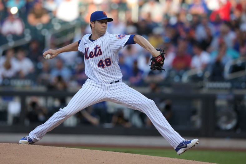 Jun 16, 2021; New York City, New York, USA; New York Mets starting pitcher Jacob deGrom (48) pitches against the Chicago Cubs during the first inning at Citi Field. Mandatory Credit: Brad Penner-USA TODAY Sports