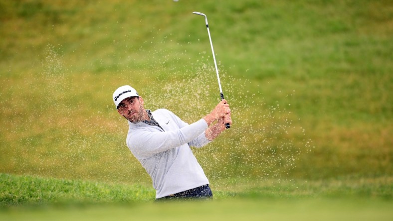 Jun 17, 2021; San Diego, California, USA; Matthew Wolff chips up onto the 11th green during the first round of the U.S. Open golf tournament at Torrey Pines Golf Course. Mandatory Credit: Orlando Ramirez-USA TODAY Sports