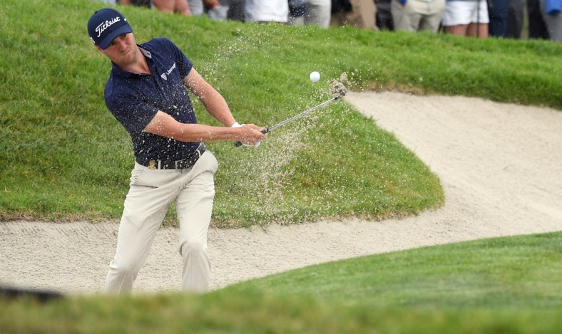Jun 18, 2021; San Diego, California, USA; Justin Thomas plays a shot from a bunker on the 18th hole during the second round of the U.S. Open golf tournament at Torrey Pines Golf Course. Mandatory Credit: Orlando Ramirez-USA TODAY Sports