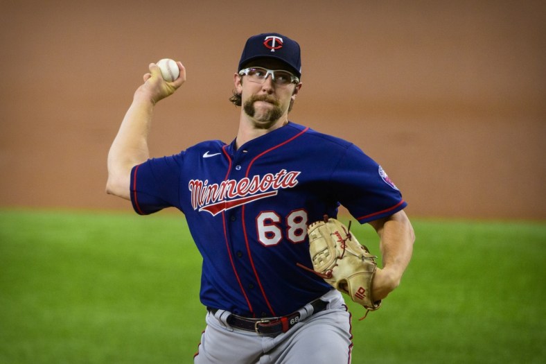 Jun 19, 2021; Arlington, Texas, USA; Minnesota Twins starting pitcher Randy Dobnak (68) pitches against the Texas Rangers during the first inning at Globe Life Field. Mandatory Credit: Jerome Miron-USA TODAY Sports