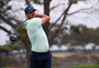 Jun 19, 2021; San Diego, California, USA; Brooks Koepka plays his shot from the fifth tee during the third round of the U.S. Open golf tournament at Torrey Pines Golf Course. Mandatory Credit: Orlando Ramirez-USA TODAY Sports