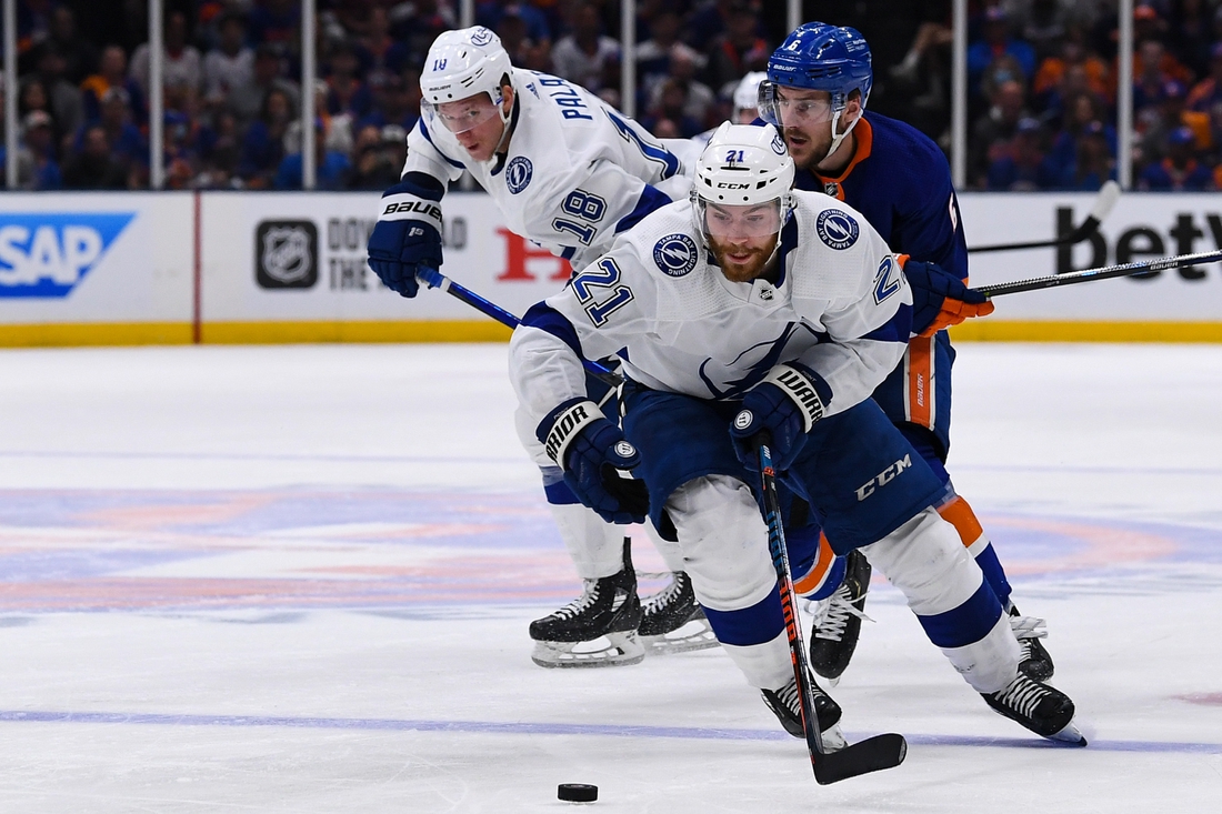 Jun 19, 2021; Uniondale, New York, USA; Tampa Bay Lightning center Brayden Point (21) skates across the blue line against the New York Islanders during the third period in game four of the 2021 Stanley Cup Semifinals at Nassau Veterans Memorial Coliseum. Mandatory Credit: Dennis Schneidler-USA TODAY Sports