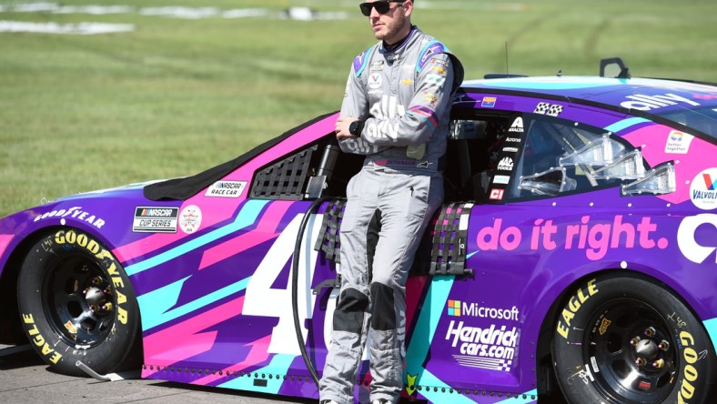 Jun 20, 2021; Nashville, Tennessee, USA; NASCAR Cup Series driver Alex Bowman (48) stands beside his car before qualifying for the Ally 400 at Nashville Superspeedway. Mandatory Credit: Christopher Hanewinckel-USA TODAY Sports