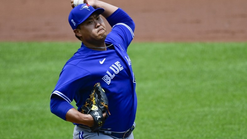 Jun 20, 2021; Baltimore, Maryland, USA; Toronto Blue Jays starting pitcher Hyun Jin Ryu (99) throws a pitch during the fourth inning against the Baltimore Orioles  at Oriole Park at Camden Yards. Mandatory Credit: Tommy Gilligan-USA TODAY Sports