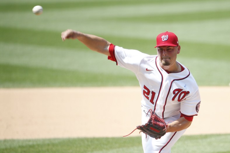Jun 20, 2021; Washington, District of Columbia, USA; Washington Nationals relief pitcher Tanner Rainey (21) throws the ball against the New York Mets during the eighth inning at Nationals Park. Mandatory Credit: Amber Searls-USA TODAY Sports