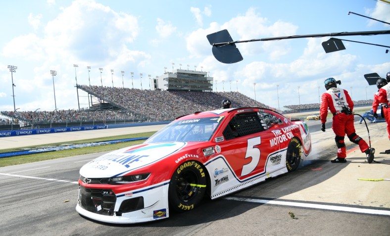 Jun 20, 2021; Nashville, Tennessee, USA; NASCAR Cup Series driver Kyle Larson (5) races out of a pit stop during the Ally 400 at Nashville Superspeedway. Mandatory Credit: Christopher Hanewinckel-USA TODAY Sports
