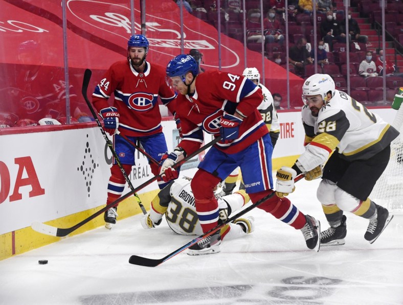 Jun 20, 2021; Montreal, Quebec, CAN; Montreal Canadiens forward Corey Perry (94) plays the puck and Vegas Golden Knights goalie Marc-Andre Fleury (29) forechecks during the first period in game four of the 2021 Stanley Cup Semifinals at the Bell Centre. Mandatory Credit: Eric Bolte-USA TODAY Sports