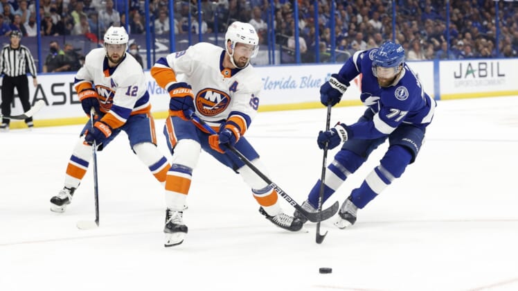 Jun 21, 2021; Tampa, Florida, USA;Tampa Bay Lightning defenseman Victor Hedman (77) and New York Islanders center Brock Nelson (29) skate after the puck during the first period in game five of the Stanley Cup Semifinals at Amalie Arena. Mandatory Credit: Kim Klement-USA TODAY Sports