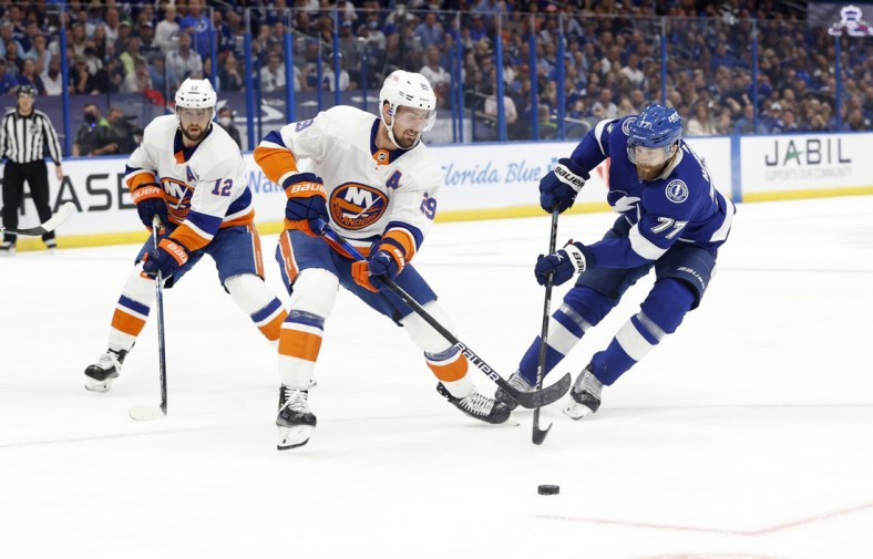 Jun 21, 2021; Tampa, Florida, USA;Tampa Bay Lightning defenseman Victor Hedman (77) and New York Islanders center Brock Nelson (29) skate after the puck during the first period in game five of the Stanley Cup Semifinals at Amalie Arena. Mandatory Credit: Kim Klement-USA TODAY Sports