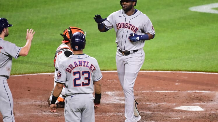 Jun 21, 2021; Baltimore, Maryland, USA; Houston Astros outfielder Yordan Alvarez (44) high fives teammates after hitting a home run in the third inning against the Baltimore Orioles at Oriole Park at Camden Yards. Mandatory Credit: Evan Habeeb-USA TODAY Sports