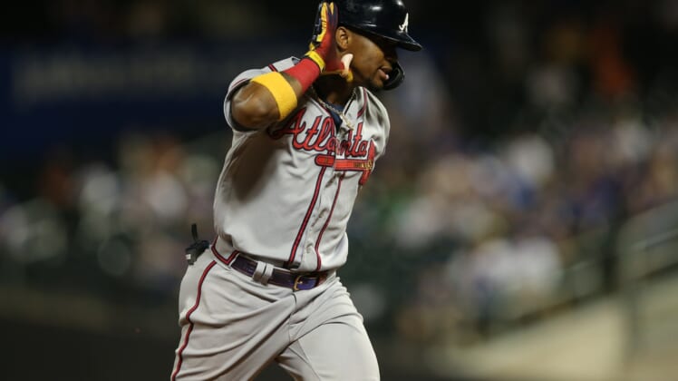 Jun 21, 2021; New York City, New York, USA; Atlanta Braves right fielder Ronald Acuna Jr. (13) gestures as he rounds the bases after hitting a solo home run against the New York Mets during the fifth inning at Citi Field. Mandatory Credit: Brad Penner-USA TODAY Sports