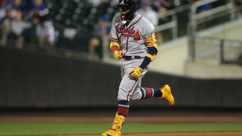 Jun 21, 2021; New York City, New York, USA; Atlanta Braves right fielder Ronald Acuna Jr. (13) reacts as he rounds the bases after hitting a solo home run against the New York Mets during the fifth inning at Citi Field. Mandatory Credit: Brad Penner-USA TODAY Sports