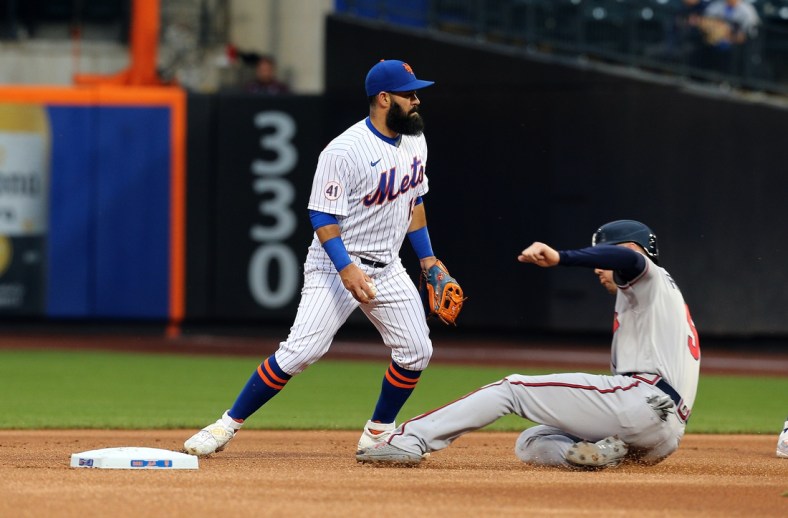 Jun 22, 2021; New York City, New York, USA; Atlanta Braves first baseman Freddie Freeman (5) forced out at second base against the New York Mets during the first inning at Citi Field. Mandatory Credit: Andy Marlin-USA TODAY Sports