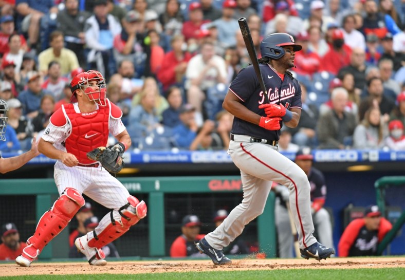 Jun 22, 2021; Philadelphia, Pennsylvania, USA; Washington Nationals first baseman Josh Bell (19) follows through on a swing for an RBI single during the first inning against the Philadelphia Phillies at Citizens Bank Park. Mandatory Credit: Eric Hartline-USA TODAY Sports