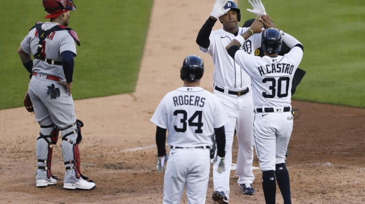 Jun 22, 2021; Detroit, Michigan, USA; Detroit Tigers second baseman Jonathan Schoop (7) celebrates with shortstop Harold Castro (30) and catcher Jake Rogers (34) after hitting a three run home run during the fourth inning against the St. Louis Cardinals at Comerica Park. Mandatory Credit: Raj Mehta-USA TODAY Sports