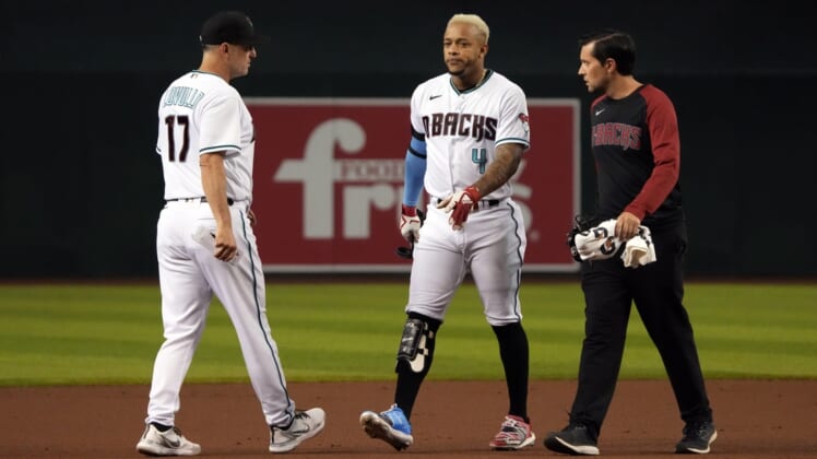Jun 22, 2021; Phoenix, Arizona, USA; Arizona Diamondbacks second baseman Ketel Marte (4) leaves the game after hitting a double against the Milwaukee Brewers in the first inning at Chase Field. Mandatory Credit: Rick Scuteri-USA TODAY Sports
