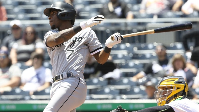 Jun 23, 2021; Pittsburgh, Pennsylvania, USA;  Chicago White Sox shortstop Tim Anderson (7) hits an RBI double against the Pittsburgh Pirates during the second inning at PNC Park. Mandatory Credit: Charles LeClaire-USA TODAY Sports