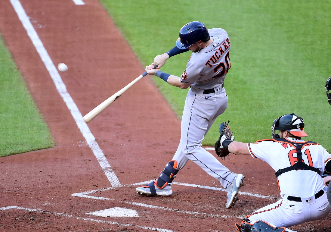 Jun 23, 2021; Baltimore, Maryland, USA; Houston Astros outfielder Kyle Tucker (30) hits an RBI single in the first inning against the Baltimore Orioles at Oriole Park at Camden Yards. Mandatory Credit: Evan Habeeb-USA TODAY Sports