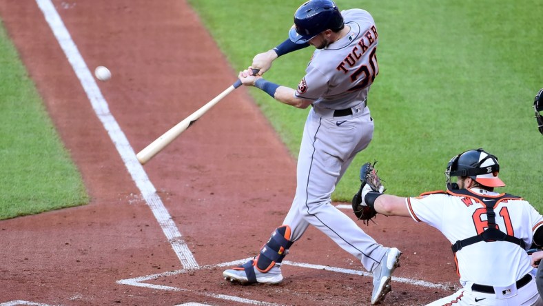 Jun 23, 2021; Baltimore, Maryland, USA; Houston Astros outfielder Kyle Tucker (30) hits an RBI single in the first inning against the Baltimore Orioles at Oriole Park at Camden Yards. Mandatory Credit: Evan Habeeb-USA TODAY Sports