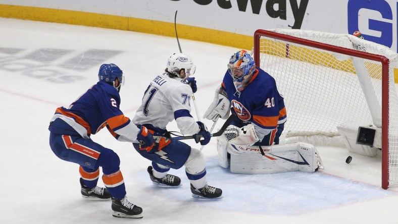 Jun 23, 2021; Uniondale, New York, USA; Tampa Bay Lightning center Anthony Cirelli (71) puts the puck past New York Islanders goaltender Semyon Varlamov (40) for a goal during the second period in game six of the 2021 Stanley Cup Semifinals at Nassau Veterans Memorial Coliseum. Mandatory Credit: Andy Marlin-USA TODAY Sports