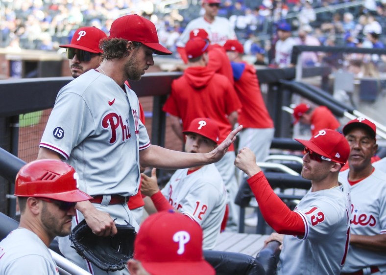 Jun 25, 2021; New York City, New York, USA; Philadelphia Phillies pitcher Aaron Nola (27) is greeted by infielder Brad Miller (13) in the fourth inning after tying Tom Seaver s National League record with 10 consecutive strikeouts against the New York Mets at Citi Field. Mandatory Credit: Wendell Cruz-USA TODAY Sports