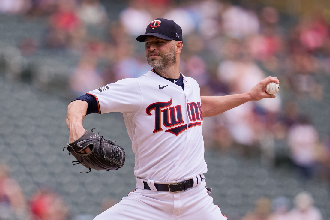 Jun 27, 2021; Minneapolis, Minnesota, USA; Minnesota Twins starting pitcher J.A. Happ (33) pitches against the Cleveland Indians in the first inning at Target Field. Mandatory Credit: Brad Rempel-USA TODAY Sports