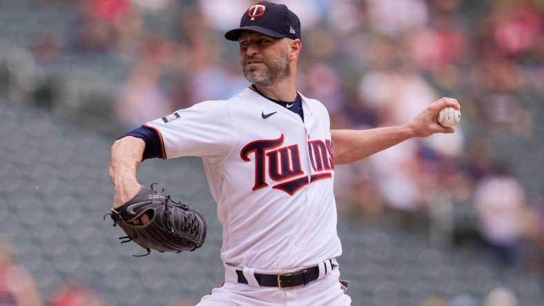 Jun 27, 2021; Minneapolis, Minnesota, USA; Minnesota Twins starting pitcher J.A. Happ (33) pitches against the Cleveland Indians in the first inning at Target Field. Mandatory Credit: Brad Rempel-USA TODAY Sports