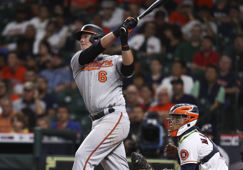 Jun 28, 2021; Houston, Texas, USA; Baltimore Orioles first baseman Ryan Mountcastle (6) hits an RBI single during the third inning against the Houston Astros at Minute Maid Park. Mandatory Credit: Troy Taormina-USA TODAY Sports