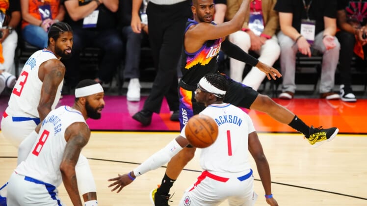 Jun 28, 2021; Phoenix, Arizona, USA; Phoenix Suns guard Chris Paul passes the ball against the Los Angeles Clippers in the first half during game five of the Western Conference Finals for the 2021 NBA Playoffs at Phoenix Suns Arena. Mandatory Credit: Mark J. Rebilas-USA TODAY Sports