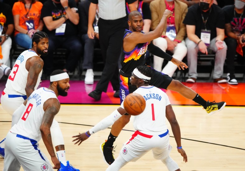 Jun 28, 2021; Phoenix, Arizona, USA; Phoenix Suns guard Chris Paul passes the ball against the Los Angeles Clippers in the first half during game five of the Western Conference Finals for the 2021 NBA Playoffs at Phoenix Suns Arena. Mandatory Credit: Mark J. Rebilas-USA TODAY Sports