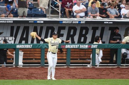 Jun 28, 2021; Omaha, Nebraska, USA;  Vanderbilt Commodores starting pitcher Jack Leiter (22) warms up before taking the field before the fourth inning against the Mississippi St. Bulldogs at TD Ameritrade Park. Mandatory Credit: Steven Branscombe-USA TODAY Sports