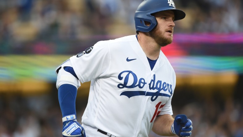 Jun 28, 2021; Los Angeles, California, USA; Los Angeles Dodgers first baseman Max Muncy (13) runs after hitting a solo home run in the first inning against the San Francisco Giants at Dodger Stadium. Mandatory Credit: Richard Mackson-USA TODAY Sports