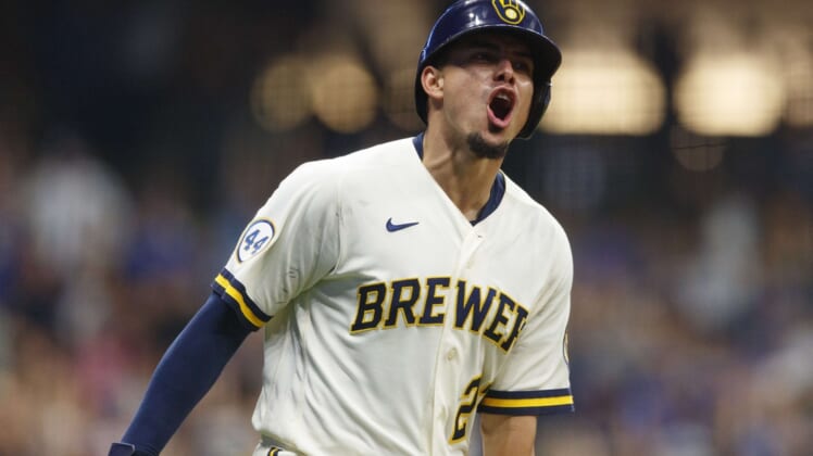 Jun 28, 2021; Milwaukee, Wisconsin, USA;  Milwaukee Brewers shortstop Willy Adames (27) reacts after hitting a three run home run during the eighth inning against the Chicago Cubs at American Family Field. Mandatory Credit: Jeff Hanisch-USA TODAY Sports