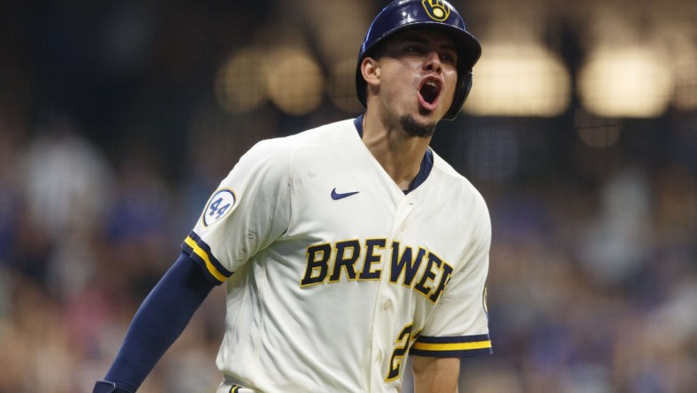 Jun 28, 2021; Milwaukee, Wisconsin, USA;  Milwaukee Brewers shortstop Willy Adames (27) reacts after hitting a three run home run during the eighth inning against the Chicago Cubs at American Family Field. Mandatory Credit: Jeff Hanisch-USA TODAY Sports