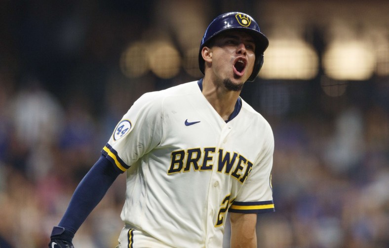 Jun 28, 2021; Milwaukee, Wisconsin, USA;  Milwaukee Brewers shortstop Willy Adames (27) reacts after hitting a three run home run during the eighth inning against the Chicago Cubs at American Family Field. Mandatory Credit: Jeff Hanisch-USA TODAY Sports