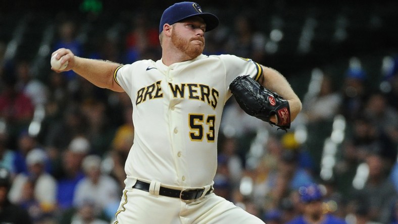 Jun 29, 2021; Milwaukee, Wisconsin, USA;  Milwaukee Brewers starting pitcher Brandon Woodruff (53) delivers a pitch against the Chicago Cubs in the fourth inning at American Family Field. Mandatory Credit: Michael McLoone-USA TODAY Sports