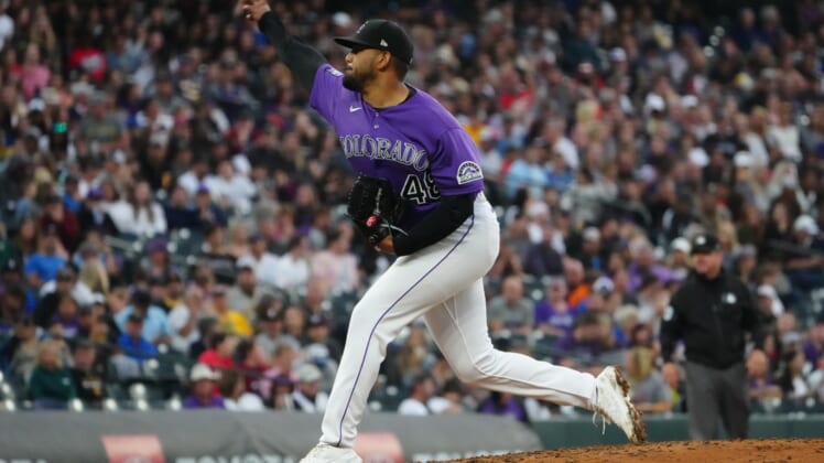 Jun 29, 2021; Denver, Colorado, USA; Colorado Rockies starting pitcher German Marquez (48) delivers a pitch in the sixth inning against the Pittsburgh Pirates at Coors Field. Mandatory Credit: Ron Chenoy-USA TODAY Sports