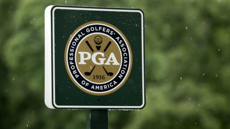Aug 8, 2017; Charlotte, NC, USA; A view of the PGA of America sign on the 15th green during a practice round for the 2017 PGA Championship at Quail Hollow Club. Mandatory Credit: Rob Schumacher-USA TODAY Sports