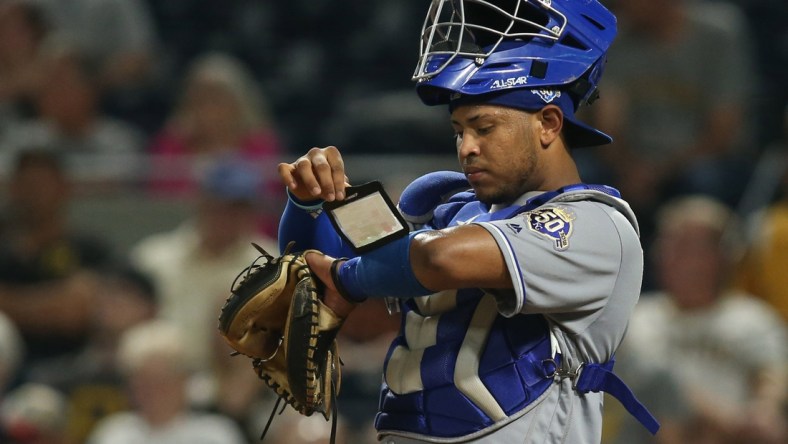 Sep 18, 2018; Pittsburgh, PA, USA;  Kansas City Royals catcher Meibrys Viloria (72) checks his play chart wristband against the Pittsburgh Pirates during the ninth inning at PNC Park. Mandatory Credit: Charles LeClaire-USA TODAY Sports