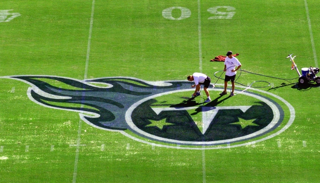 Groundkeepers paint the Tennessee Titans logo at midfield in preparation Aug. 21, 1999 at the Adelphia Coliseum in downtown Nashville for the opening game Aug. 27.

Tennessee Titans Getting Adelphia Coliseum Ready
