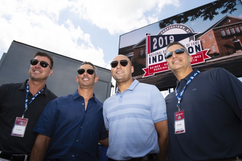 Jul 21, 2019; Cooperstown, NY, USA; (left to right) Former New York Yankees first baseman Tino Martinez and catcher Jorge Posada and shortstop Derek Jeter and pitcher Andy Pettitte pose for a photo prior to the 2019 National Baseball Hall of Fame induction ceremony at the Clark Sports Center. Mandatory Credit: Gregory J. Fisher-USA TODAY Sports