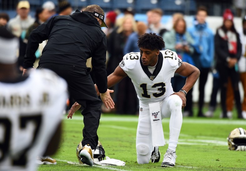 Dec 22, 2019; Nashville, Tennessee, USA; New Orleans Saints wide receiver Michael Thomas (13) and New Orleans Saints head coach Sean Payton slap hands before the game against the Tennessee Titans at Nissan Stadium. Mandatory Credit: Christopher Hanewinckel-USA TODAY Sports