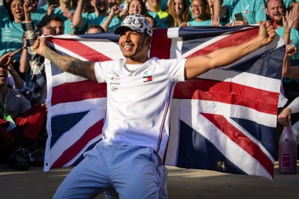 Nov 3, 2019; Austin, TX, USA; Mercedes AMG Petronas Motorsport driver Lewis Hamilton (44) of Great Britain celebrates winning his sixth world championship after the United States Grand Prix at Circuit of the Americas. Mandatory Credit: Jerome Miron-USA TODAY Sports