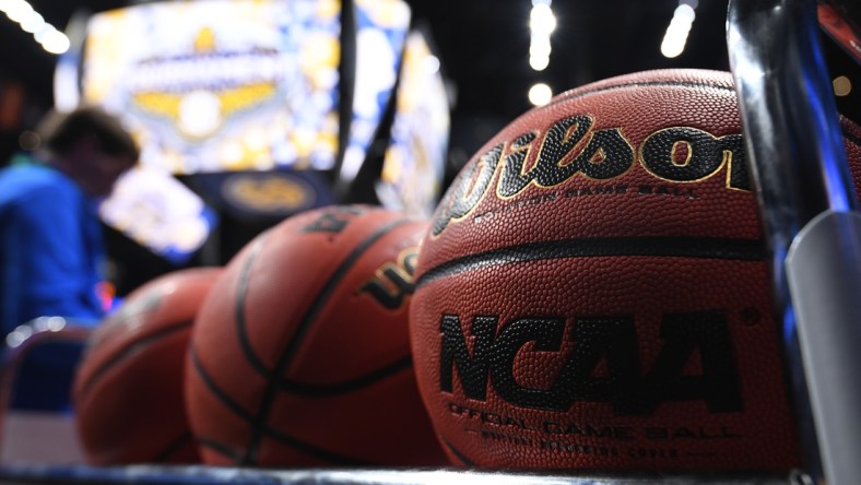 Mar 12, 2020; Nashville, Tennessee, USA; View of a rack of basketballs on the court after the announcement the SEC Conference Tournament was cancelled at Bridgestone Arena. Mandatory Credit: Christopher Hanewinckel-USA TODAY Sports