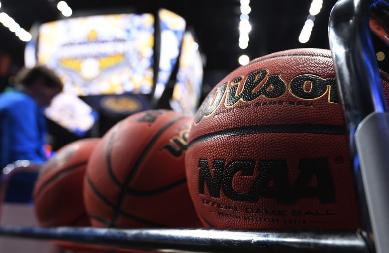 Mar 12, 2020; Nashville, Tennessee, USA; View of a rack of basketballs on the court after the announcement the SEC Conference Tournament was cancelled at Bridgestone Arena. Mandatory Credit: Christopher Hanewinckel-USA TODAY Sports