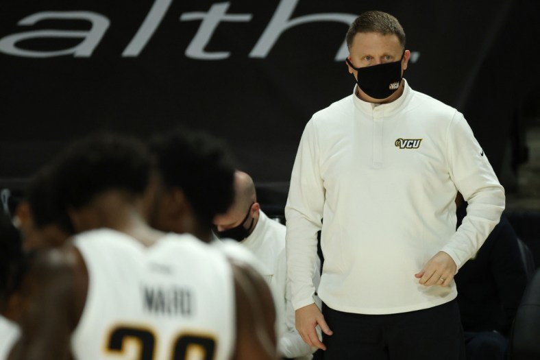 Dec 12, 2020; Richmond, Virginia, USA; VCU Rams head coach Mike Rhoades looks on from the bench against the Old Dominion Monarchs in the second half at Stuart C. Siegel Center. Mandatory Credit: Geoff Burke-USA TODAY Sports