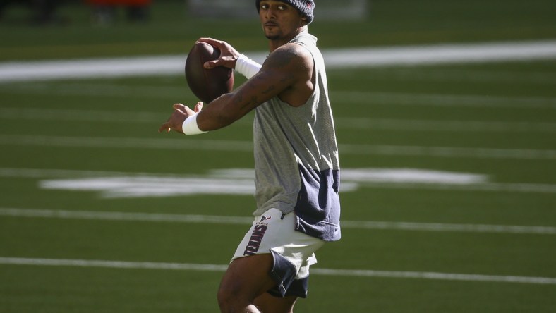 Jan 3, 2021; Houston, Texas, USA; Houston Texans quarterback Deshaun Watson (4) warms up before a game against the Tennessee Titans at NRG Stadium. Mandatory Credit: Troy Taormina-USA TODAY Sports