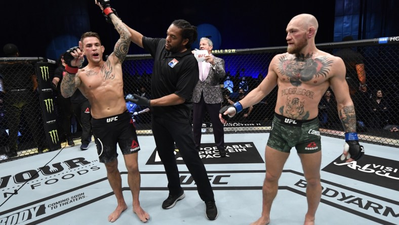 Jan 23, 2021; Abu Dhabi, United Arab Emirates; Dustin Poirier reacts after his knockout victory over Conor McGregor of Ireland in a lightweight fight during the UFC 257 event inside Etihad Arena on UFC Fight Island.  Mandatory Credit: Jeff Bottari/Handout Photo via USA TODAY Sports