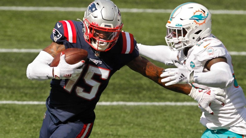 Published Caption:  Patriots receiver N   Keal Harry fends off Dolphins defender Jerome Baker after a third-quarter reception in Week 1. [The Providence Journal / Kris Craig] Original Caption:  Patriots receiver N'Keal Harry fends off Dolphins defender Jerome Baker after a third-quarter reception in Week 1.

Patriots Expecting More From N Keal Harry